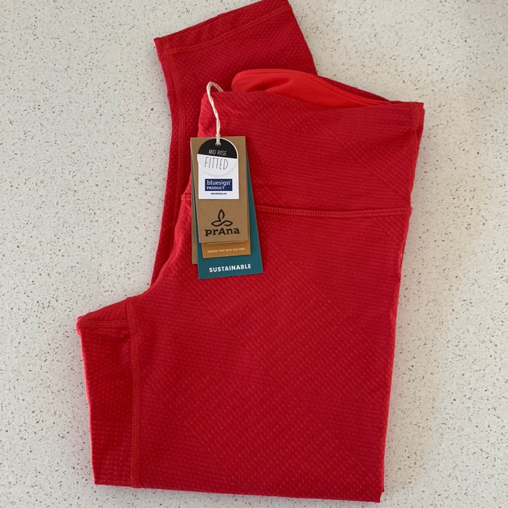 Prana workout capri. Size small. New with tags. red/pink color. See pictures.